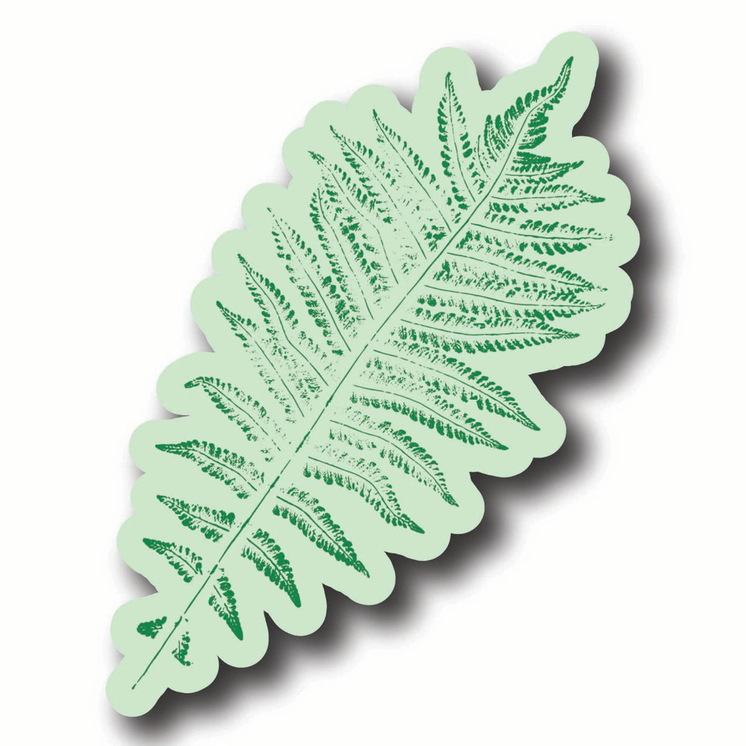 Fern leaf-shaped sticker on a white background