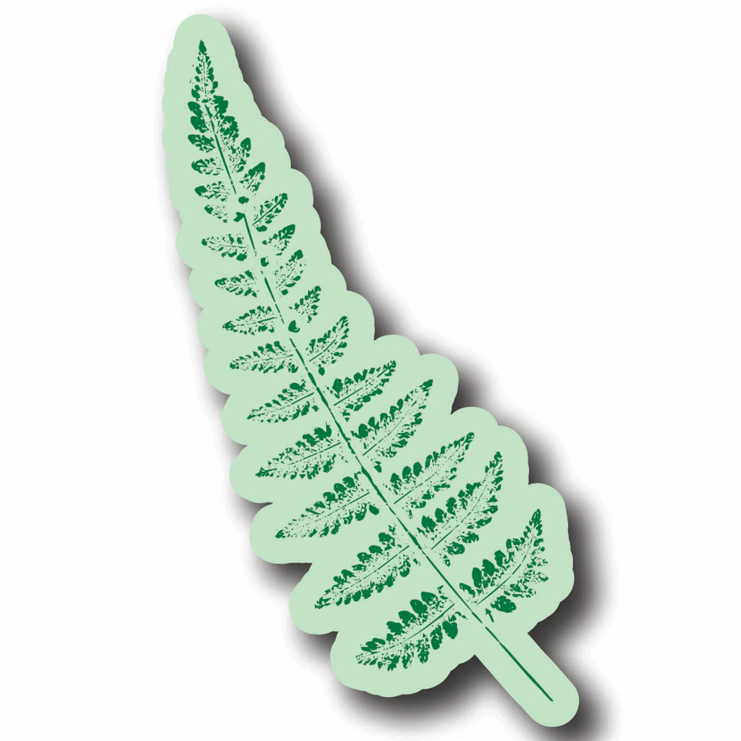 Two-tone green fern leaf-shaped sticker on a white background