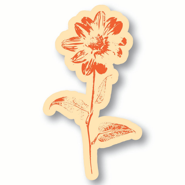 A sticker of an orange red sunflower design on a peach background
