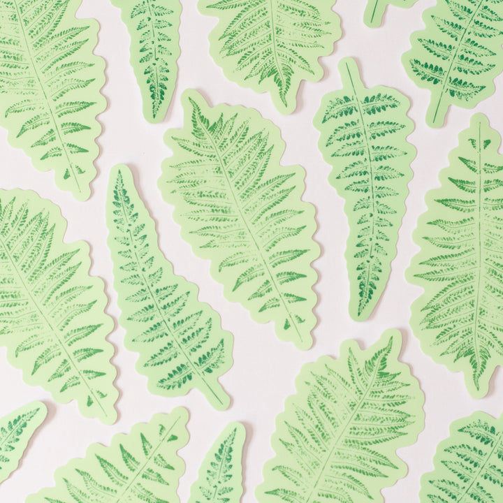 Pattern of two kinds of fern green leaf stickers on a white background