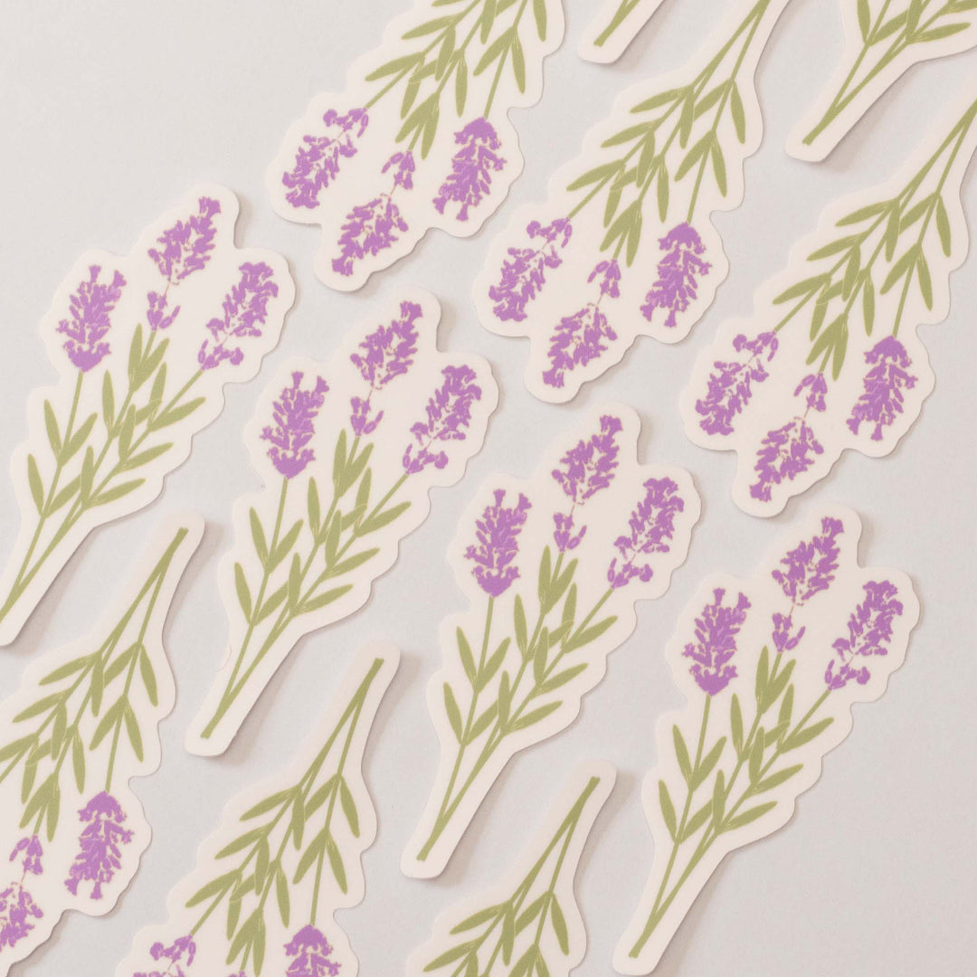 Pattern of lavender stickers flowers and leaves on a light background