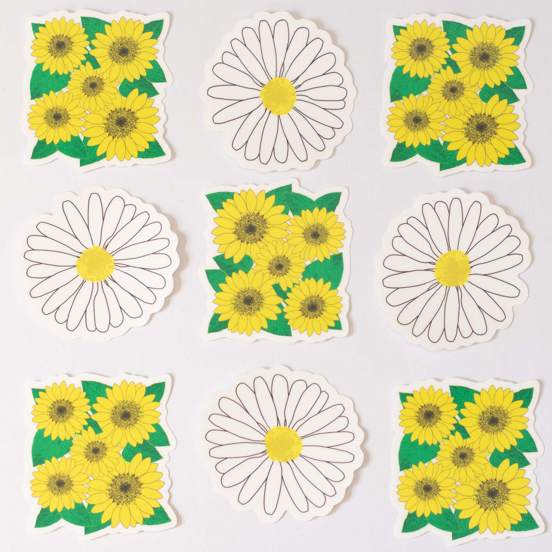 Set of sunflower and daisy stickers on a white background